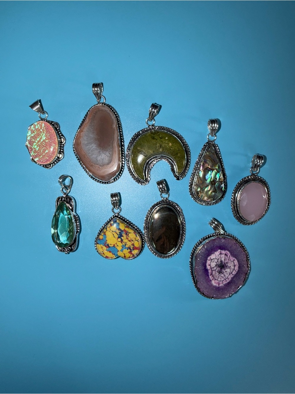 9 Assorted gem pendants